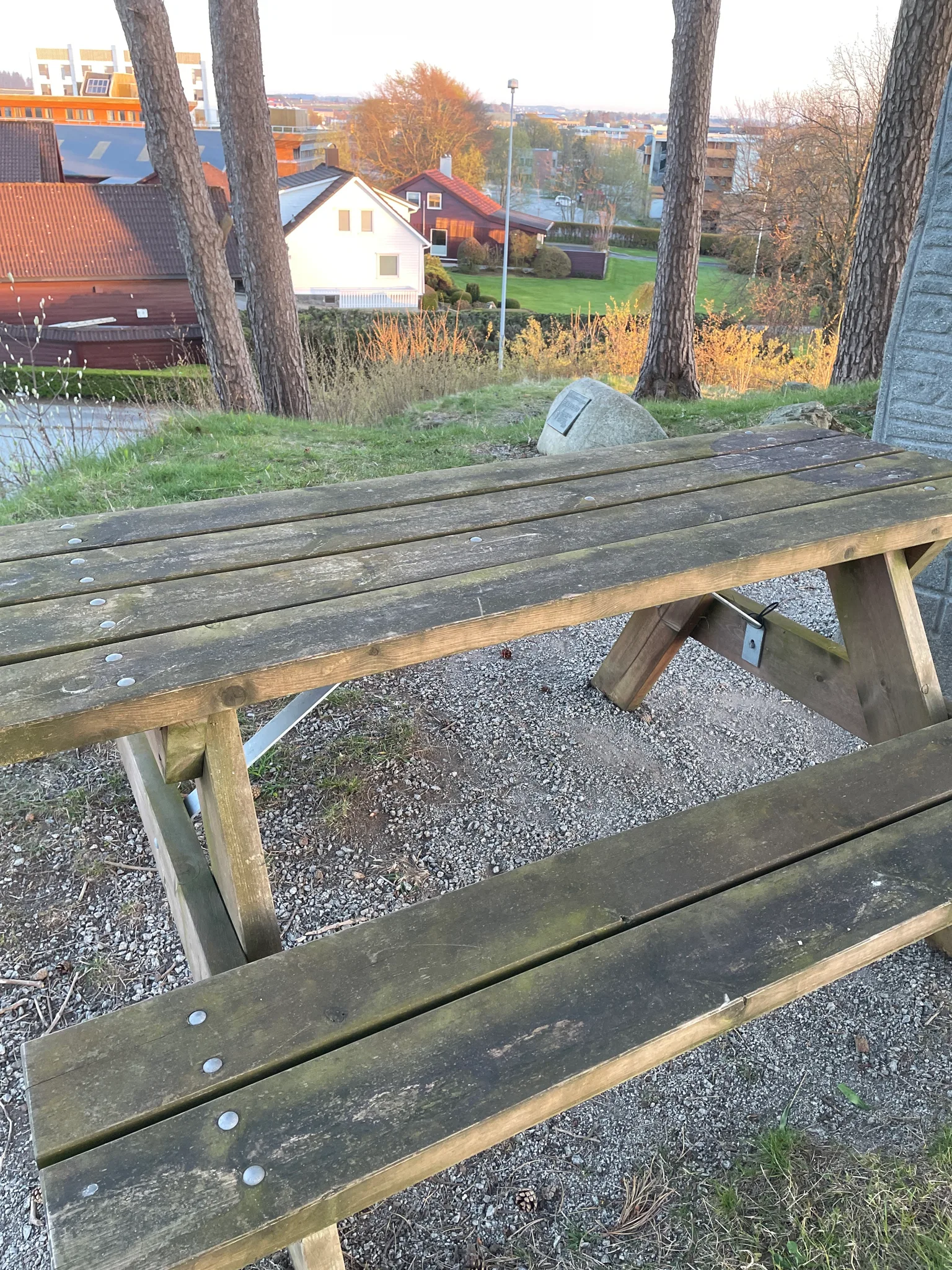 Bench: a bench by a monument