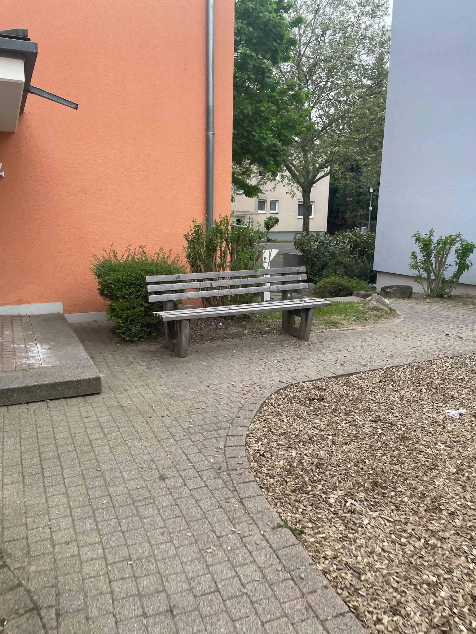 Bench: a cozy bench inbetween houses